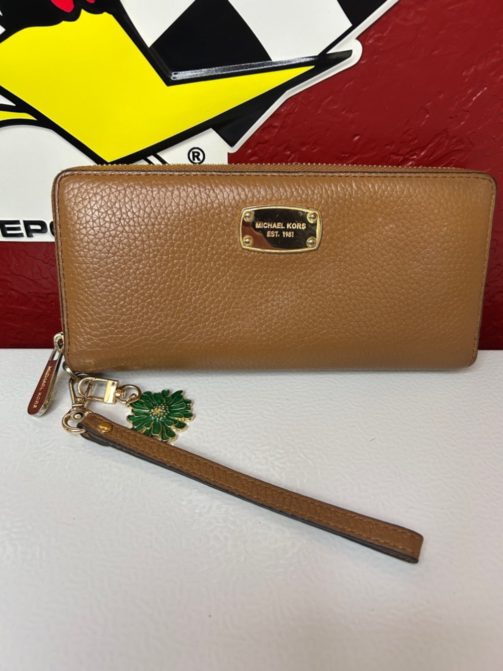 Michael Kors Tan Pebbled Leather Wristlet Wallet with Green Charm